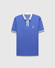 Mens Ridley Pique Polo in blue pique with a white collar, two-button placket, white striped cuffs, and an embroidered white Psycho Bunny skull logo on the left chest.