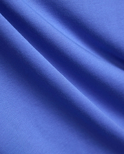 Mens Ridley Pique Polo in a vibrant royal blue, showcasing its refined, breathable pique knit fabric texture, embodying Psycho Bunny's premium streetwear style.