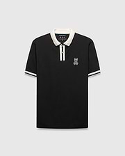 Mens Ridley Pique Polo, classic fit, black pique fabric with cream ribbed collar, two-button placket stripe, and cuff stripes. Features a white embroidered Psycho Bunny skull logo on the left chest. (4)