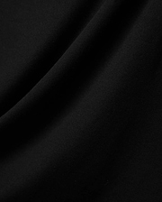 Mens Ridley Pique Polo in classic black, featuring the refined, breathable pique fabric texture with subtle folds, embodying premium Psycho Bunny streetwear. (5)