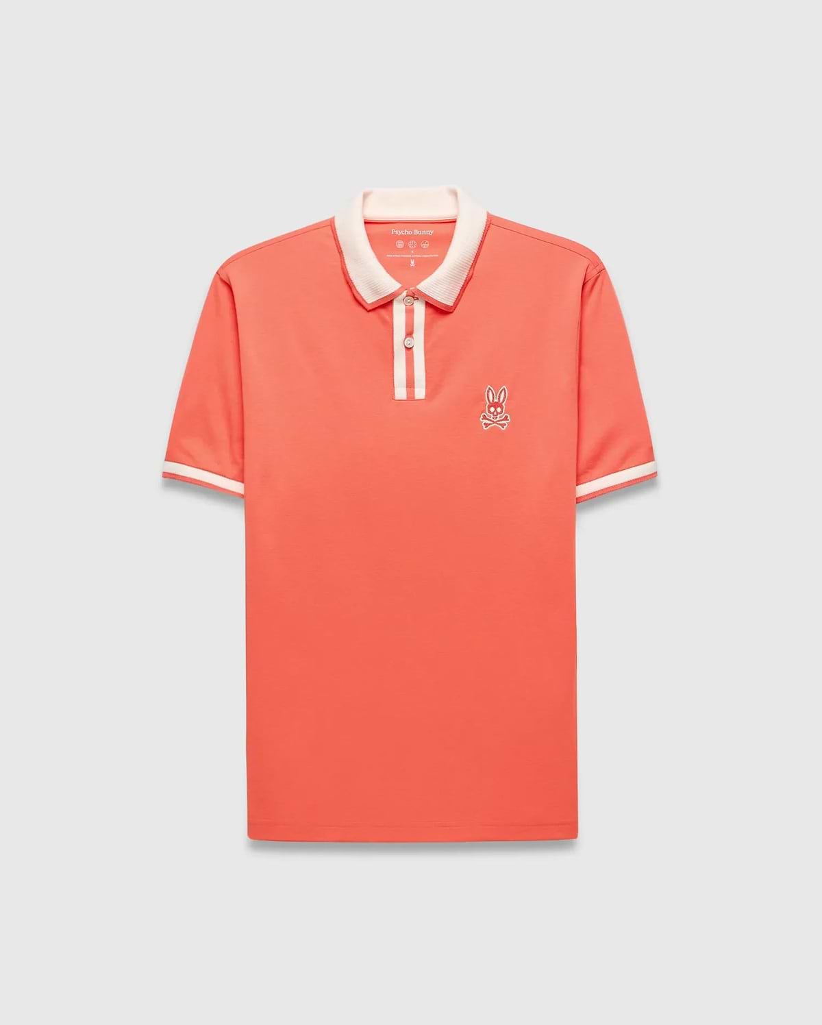 Mens Ridley Pique Polo in coral pique, featuring a classic fit, cream ribbed collar and cuffs with stripes, a two-button placket with cream stripe, and an embroidered white Psycho Bunny skull logo on the left chest. (6)