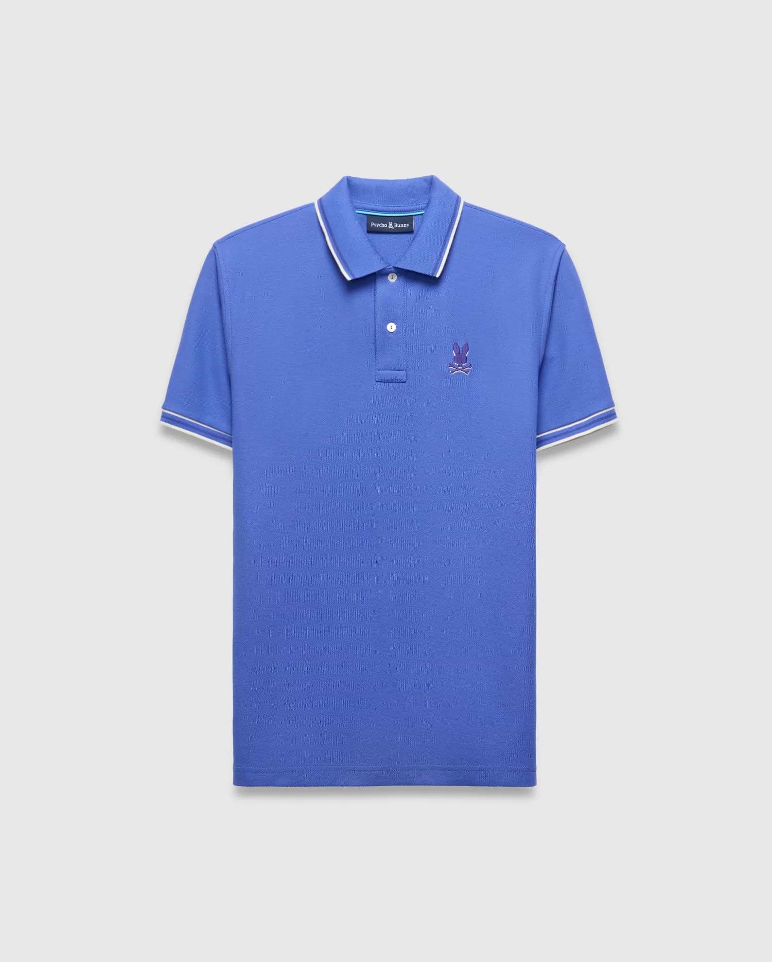 Mens Brad Pique Polo in vibrant blue, classic fit, with white tipped collar and sleeves, featuring a small purple embroidered Psycho Bunny skull logo on the left chest.