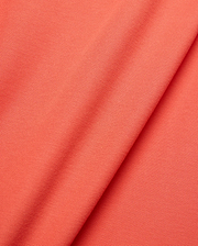 Mens Brad Pique Polo in vibrant coral, showcasing a refined pique knit texture. This premium Psycho Bunny polo features the iconic embroidered bunny skull logo on the chest. (6)