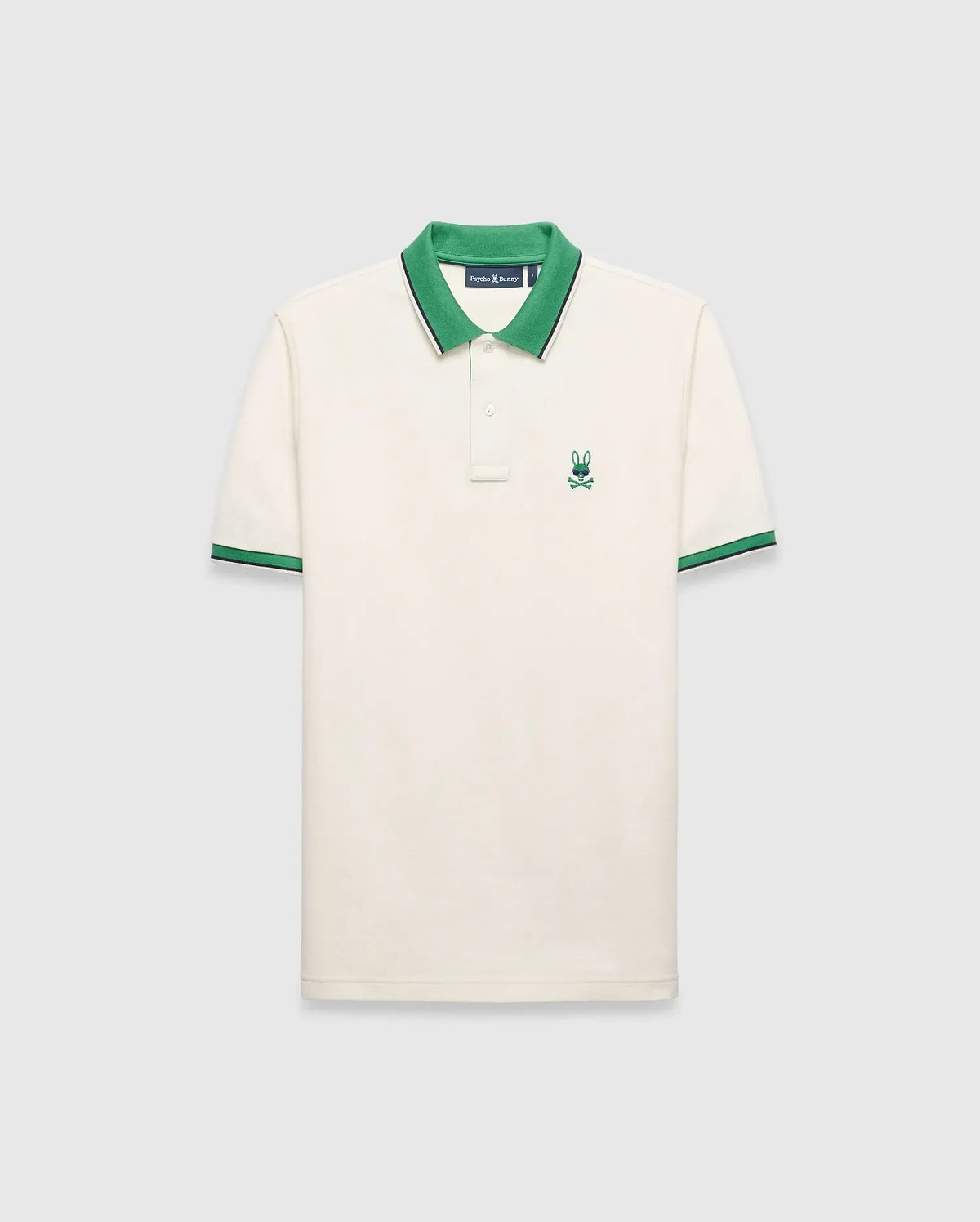 Mens Sunny Pique Polo, cream classic fit pique knit with a green collar and striped cuffs, featuring a small embroidered green Psycho Bunny skull logo on the left chest.