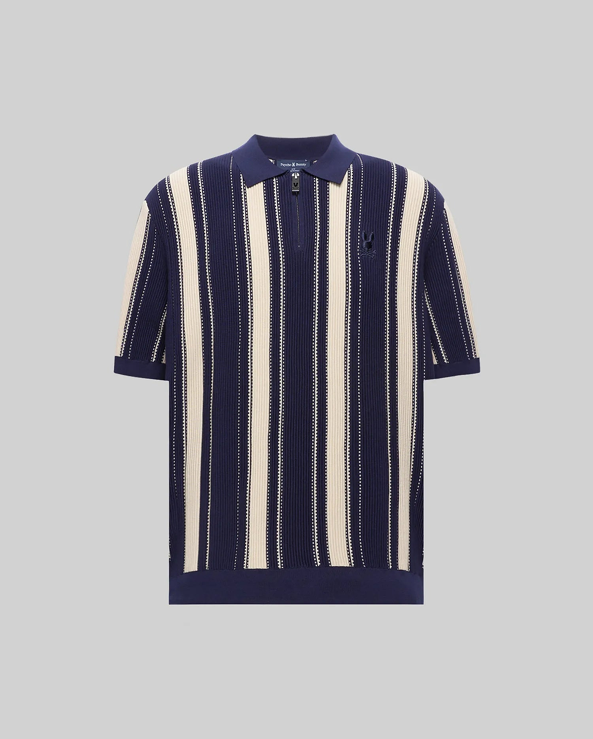 Mens Cliff Knit Zip Polo featuring navy and cream vertical stripes, a relaxed knit texture, quarter-zip placket, and a small embroidered Psycho Bunny skull logo on the left chest. (5)