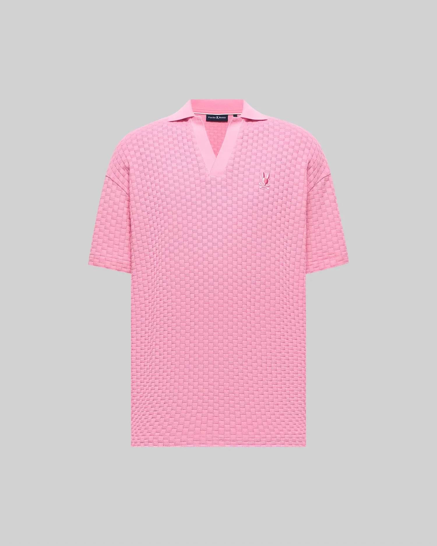 Mens Garen Knit Polo in pink, featuring a relaxed fit, textured basketweave knit, V-neck collar, and a small embroidered pink Psycho Bunny skull logo on the left chest. (5)