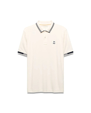 Mens Timmy Interlock Polo, cream interlock knit with navy and white striped collar and cuffs, featuring a small embroidered Psycho Bunny skull logo on the left chest.