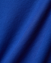 Mens Timmy Interlock Polo in a rich, vibrant royal blue, crafted from premium, soft interlock knit fabric, showcasing its refined texture and elegant drape, perfect for sophisticated streetwear.