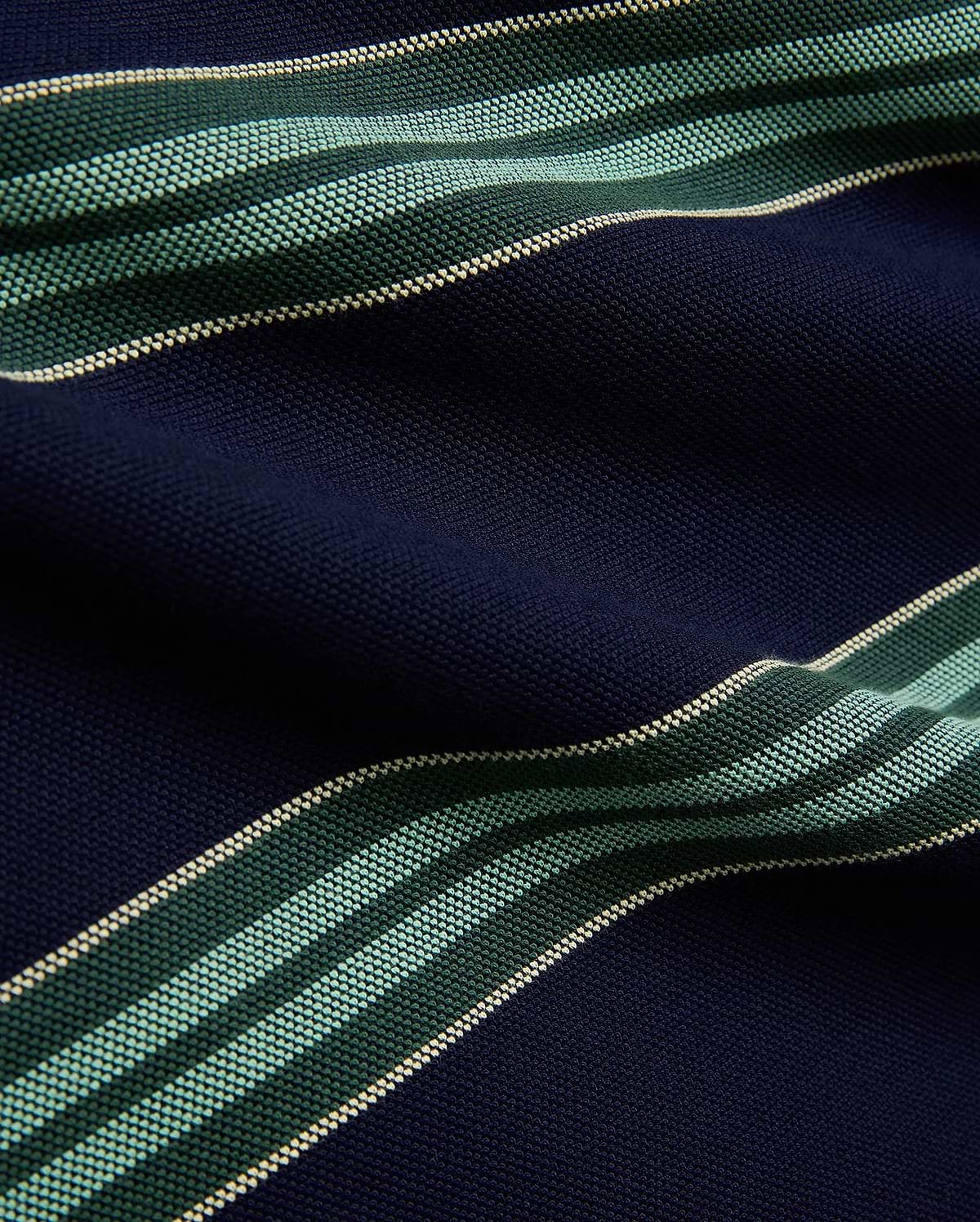 Mens Drew Striped Pique Polo in navy blue, featuring bold horizontal stripes in dark green, light green, and cream, showcasing its textured pique fabric.