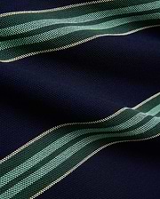 Mens Drew Striped Pique Polo in navy blue, featuring bold horizontal stripes in dark green, light green, and cream, showcasing its textured pique fabric.