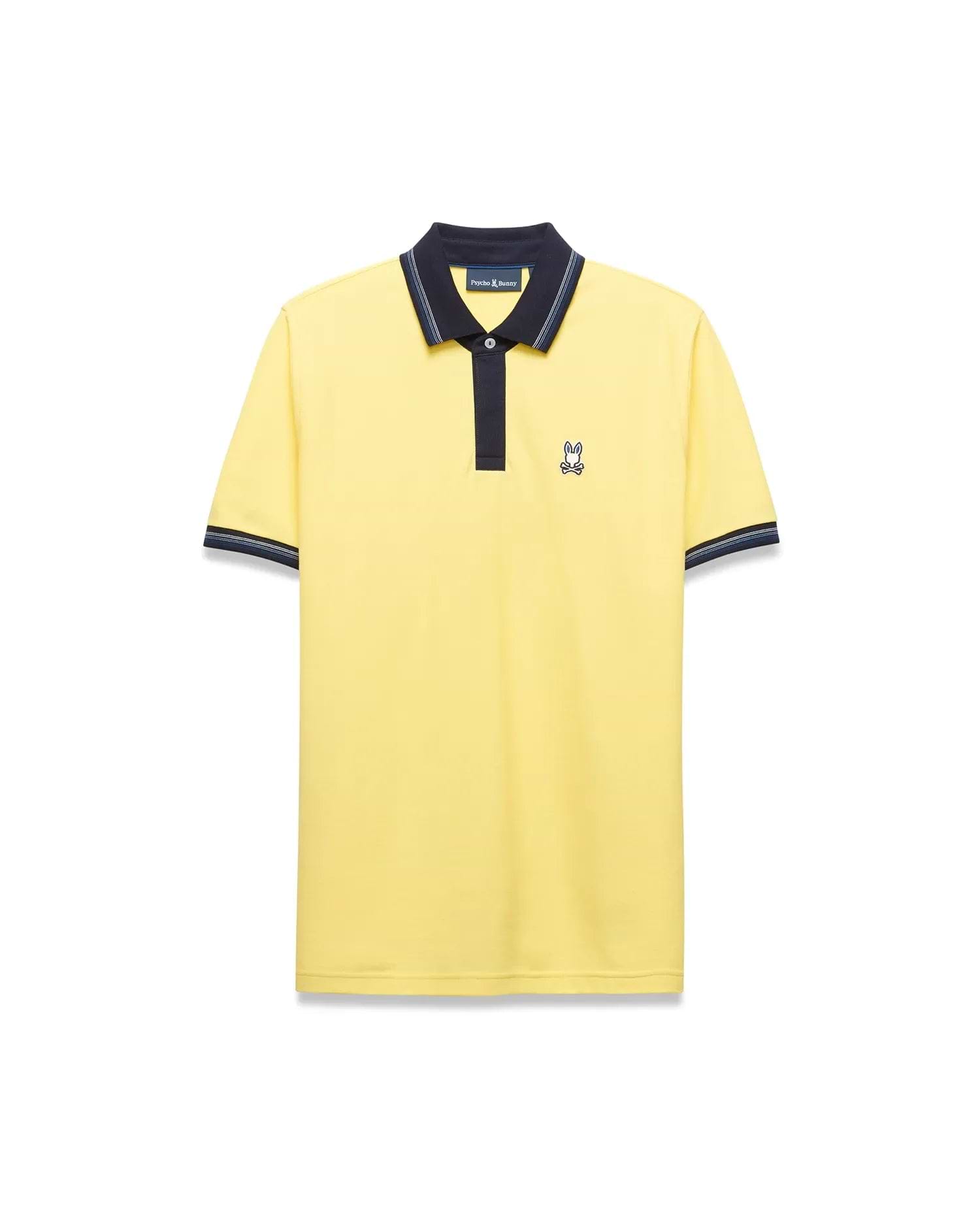Mens Jaydon Pique Polo in bright yellow, featuring a navy blue collar with white tipping, a two-button placket, ribbed cuffs with matching stripes, and a small embroidered Psycho Bunny logo on the left chest for a classic fit. (5)