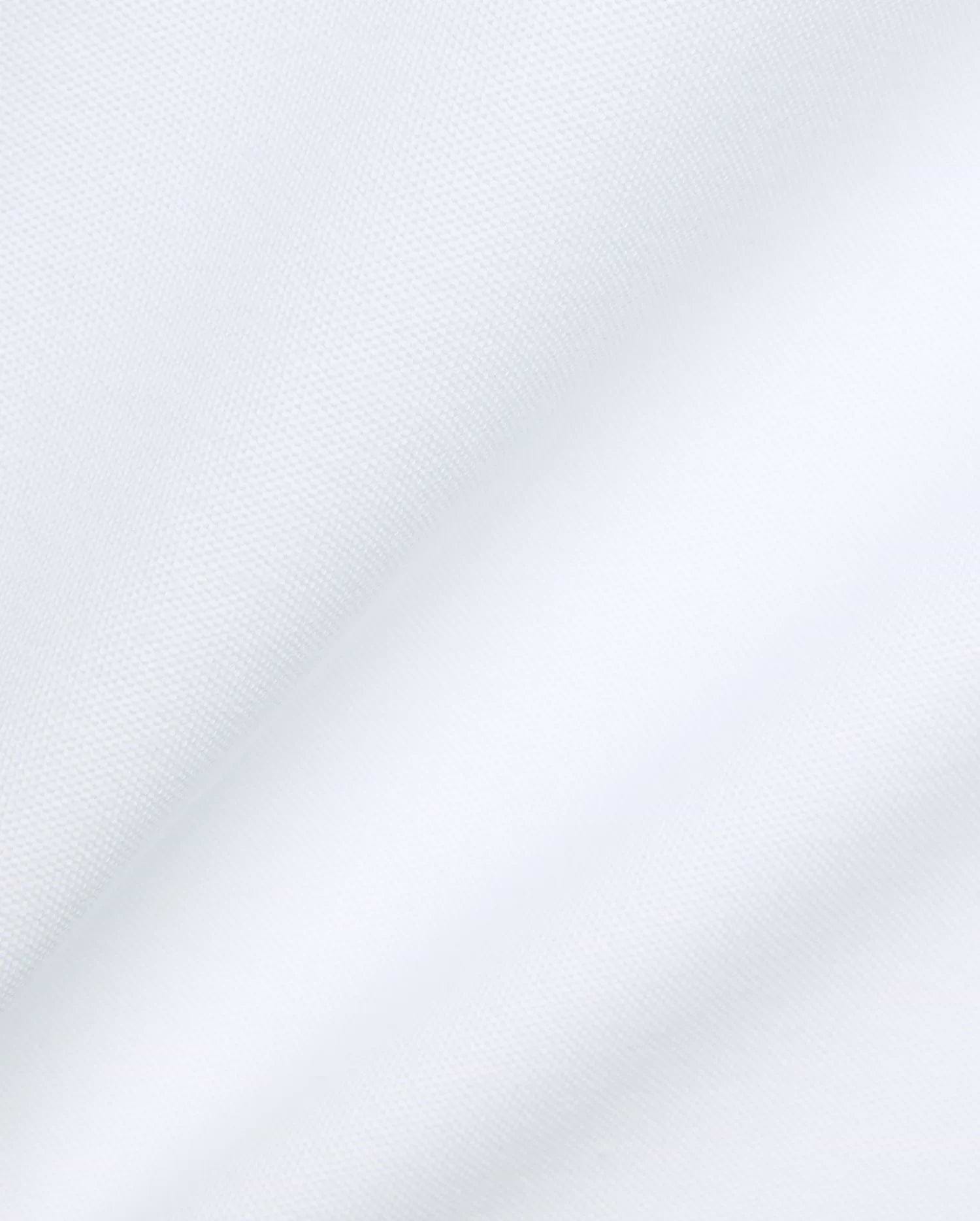 Psycho Bunny Mens Jaydon Pique Polo in crisp white, featuring the iconic brand's premium textured pique fabric with subtle folds, embodying refined streetwear. (6)