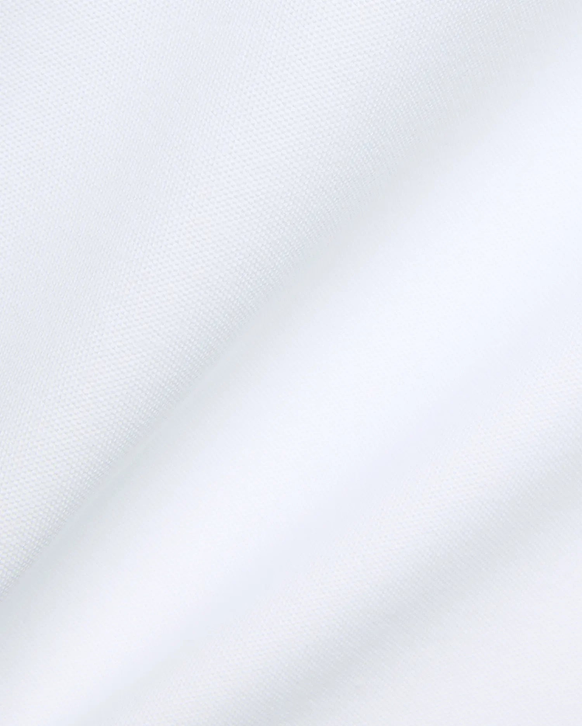 Psycho Bunny Mens Jaydon Pique Polo in crisp white, featuring the iconic brand's premium textured pique fabric with subtle folds, embodying refined streetwear. (6)