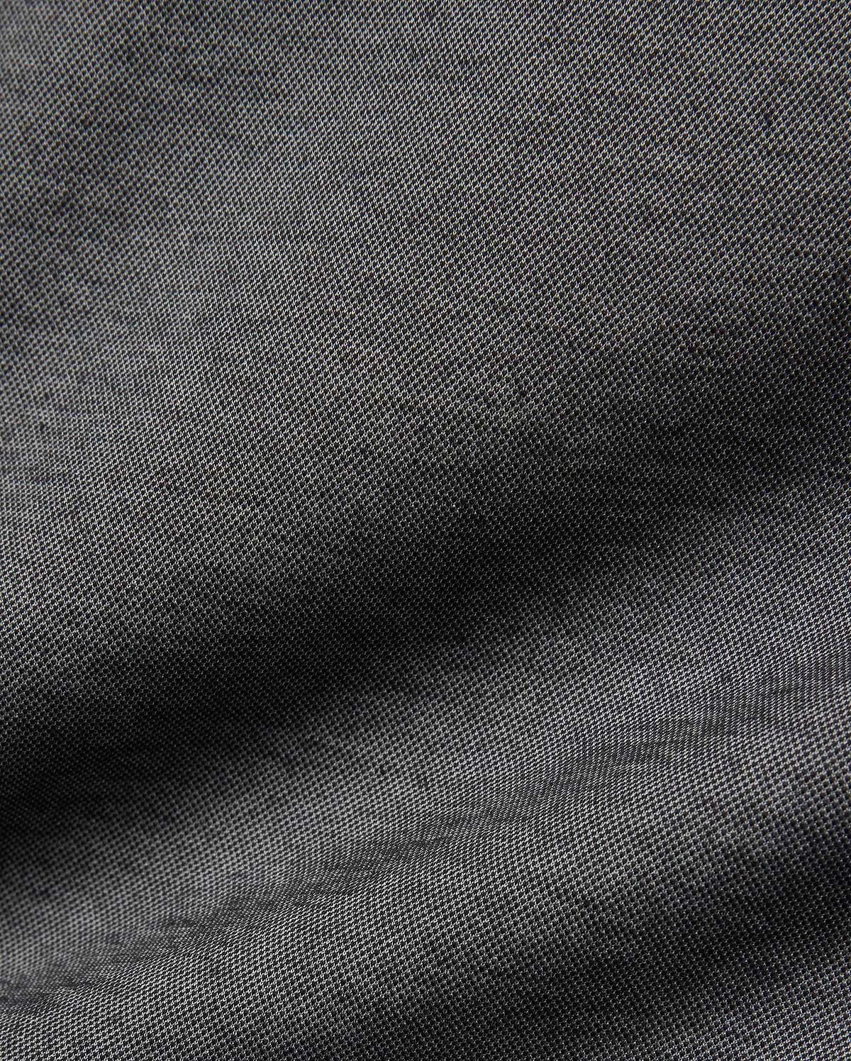 Psycho Bunny MENS JOJI PERFORMANCE POLO in a deep charcoal grey, featuring a premium, subtly textured pique knit fabric, offering a refined streetwear aesthetic and classic fit.