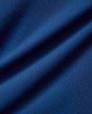 Psycho Bunny Mens Joji Performance Polo in deep blue, featuring a finely textured pique knit fabric, embodying refined streetwear style. (6)