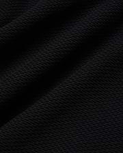 Mens Selby Knit Polo in deep black, showcasing a luxurious, finely textured knit fabric with a subtle, sophisticated diagonal pattern, ideal for refined streetwear. (5)