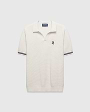 Cream Mens Selby Knit Polo featuring a unique textured knit fabric, open collar, small black embroidered Psycho Bunny skull logo on the left chest, and ribbed cuffs with black double stripes. (5)