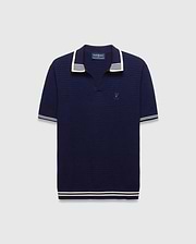 Mens Elowen Knit Polo in navy, featuring a textured knit fabric, white striped collar, cuffs, and hem, with a small embroidered Psycho Bunny skull logo on the left chest. (4)