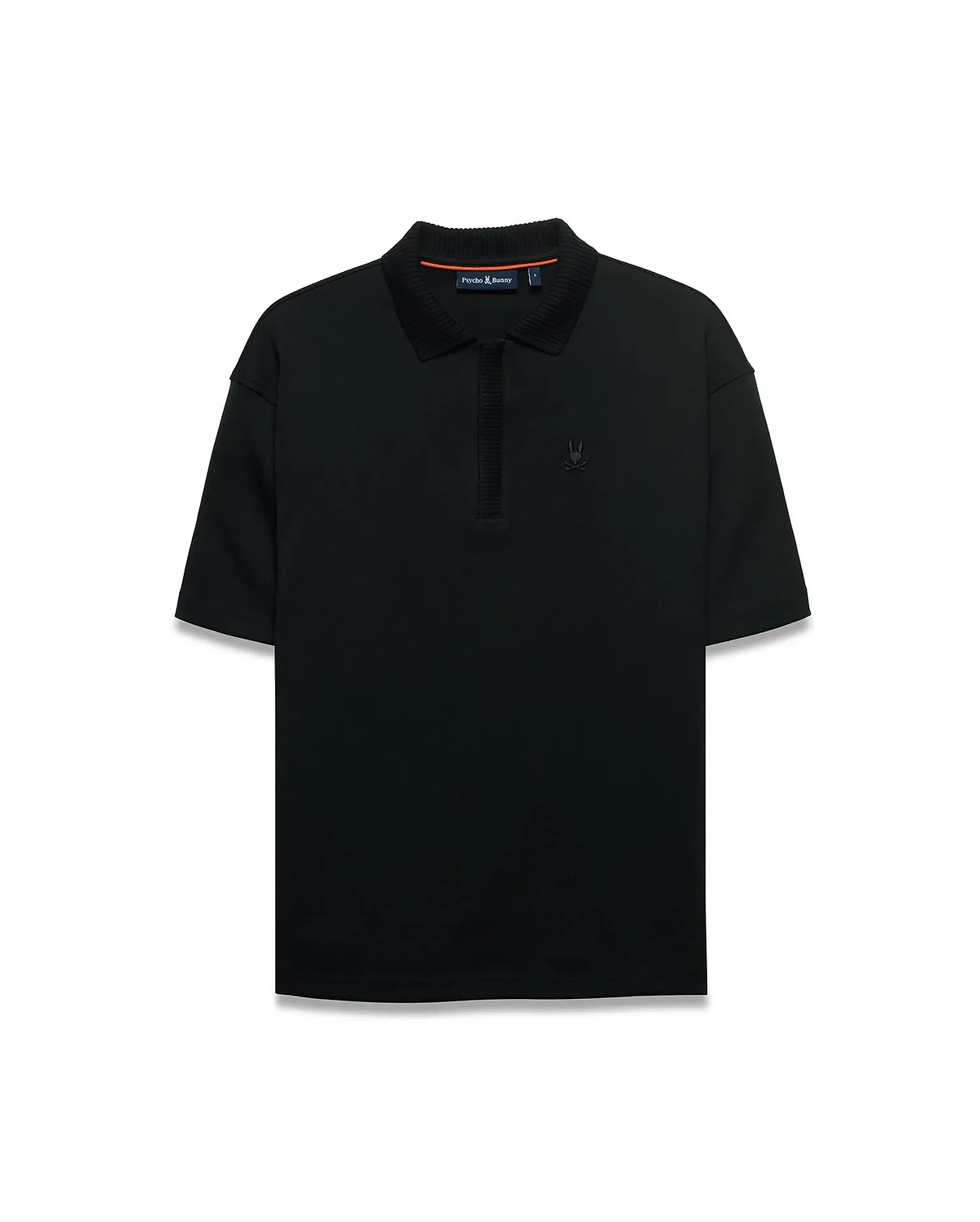 Men's Nolen Oversized Jersey Polo in black jersey fabric, featuring a ribbed collar and placket, with a small embroidered Psycho Bunny skull logo on the left chest and subtle orange accent on the inner collar. (5)