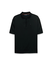 Men's Nolen Oversized Jersey Polo in black jersey fabric, featuring a ribbed collar and placket, with a small embroidered Psycho Bunny skull logo on the left chest and subtle orange accent on the inner collar. (5)