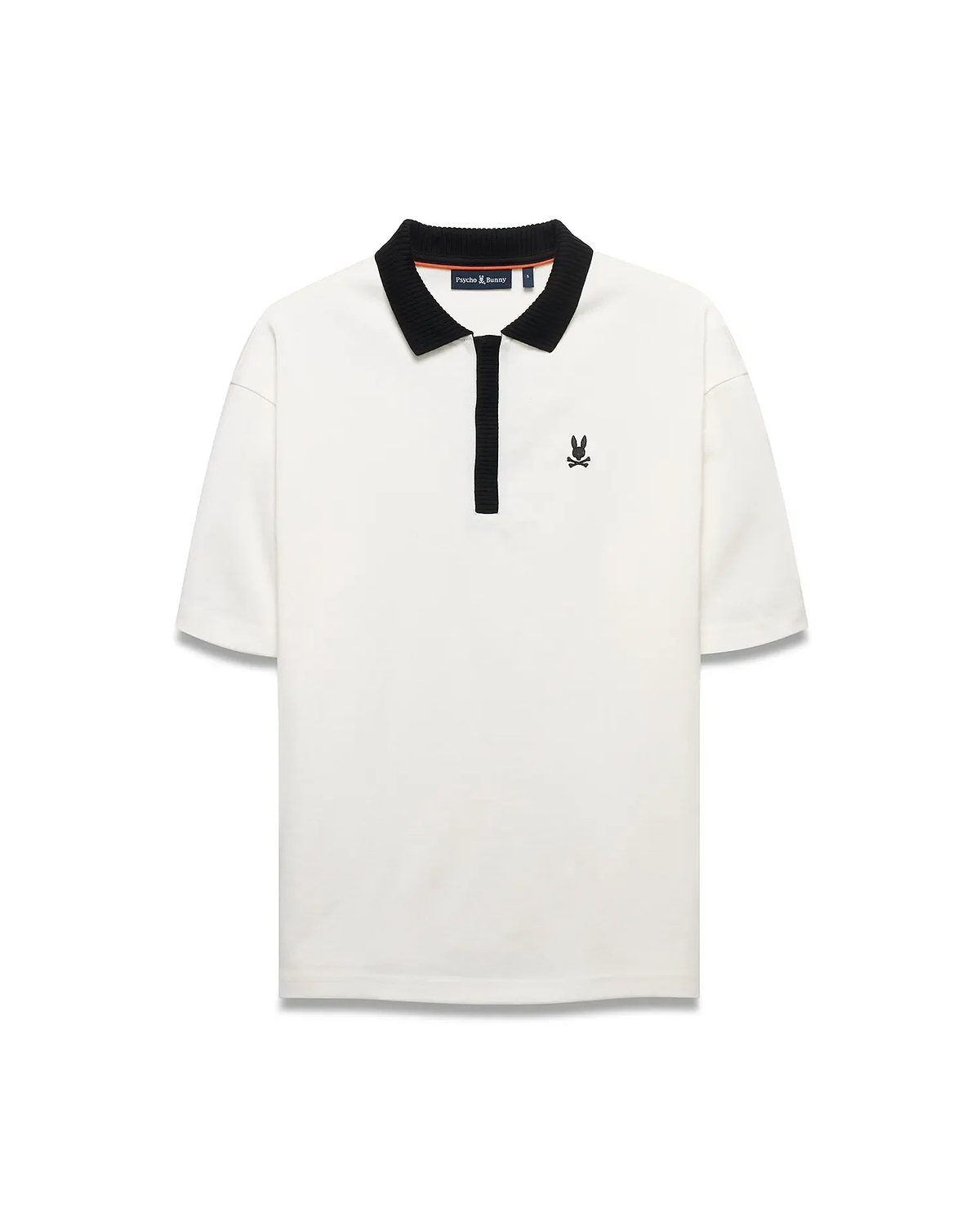 Men's Nolen Oversized Jersey Polo in cream, featuring a black ribbed collar, black placket, and a small black embroidered Psycho Bunny skull logo on the left chest. (5)
