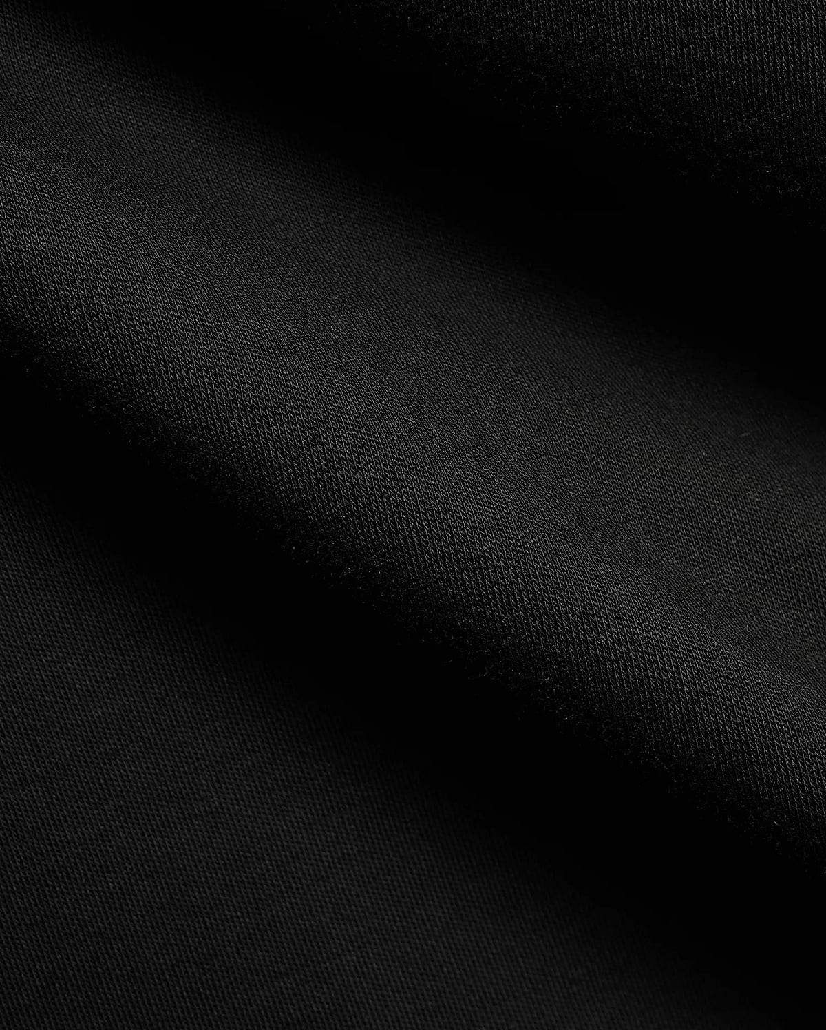 Men's Teddy Johnny Collar Polo, a classic black pique knit with a refined texture, featuring the signature embroidered Psycho Bunny skull logo on the chest for premium streetwear. (6)