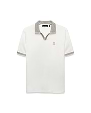 Men's Teddy Johnny Collar Polo, a classic fit white jersey knit polo with a black and white micro-houndstooth Johnny collar and sleeve cuffs, featuring a small embroidered gold Psycho Bunny skull logo on the left chest. (5)