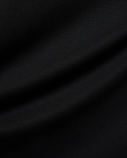 Mens Nasser Interlock Johnny Collar Polo in classic black, featuring smooth interlock fabric and the signature embroidered Psycho Bunny skull logo on the left chest.
