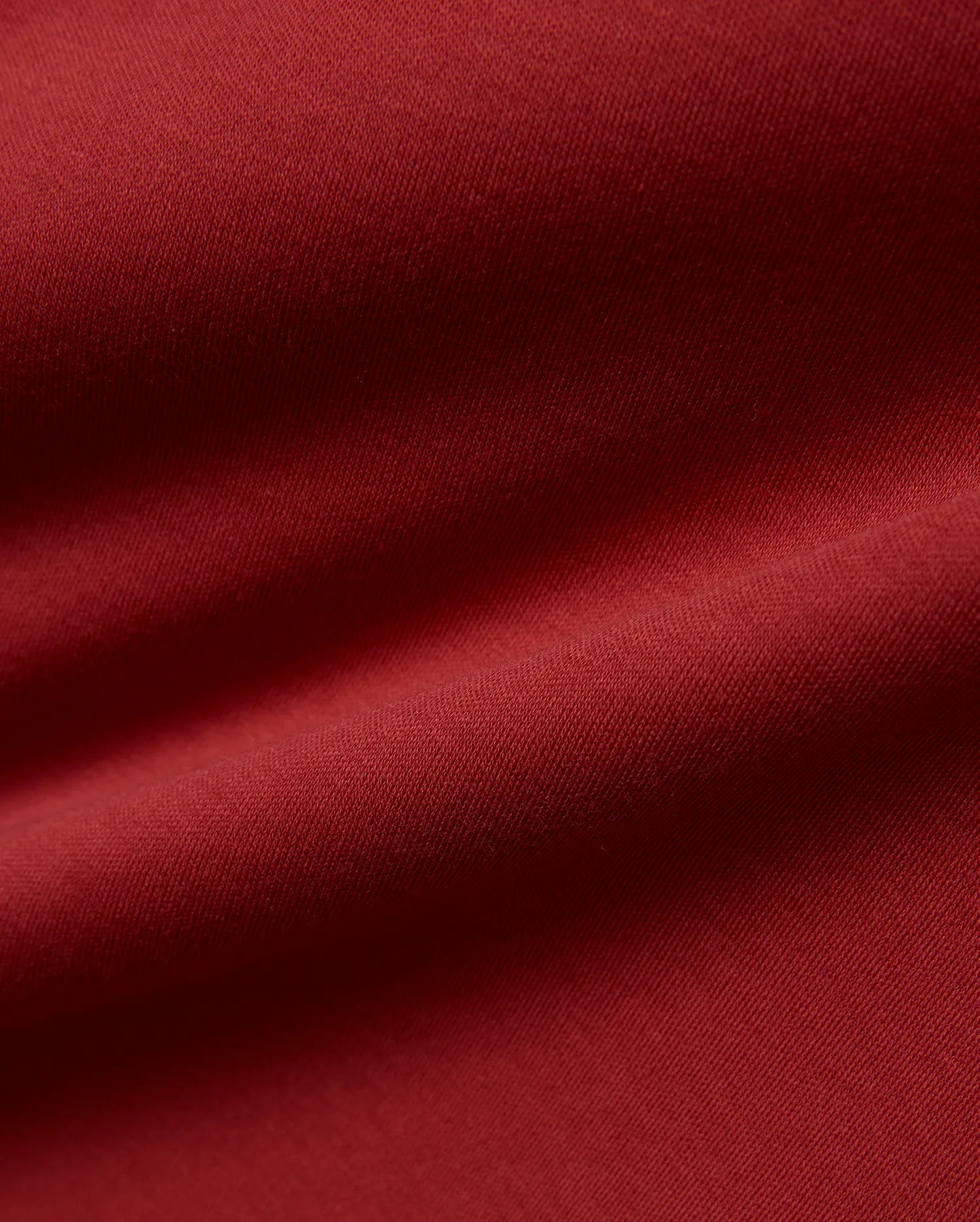 Psycho Bunny Men's Nasser Johnny Collar Polo in a vibrant, deep crimson red, crafted from premium, soft-touch jersey knit fabric, embodying refined streetwear style. (6)