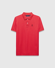 Mens Blythe Pique Polo in vibrant red, featuring a classic fit, pique texture, two-button placket with white buttons, and a small black embroidered Psycho Bunny skull logo on the left chest. (5)