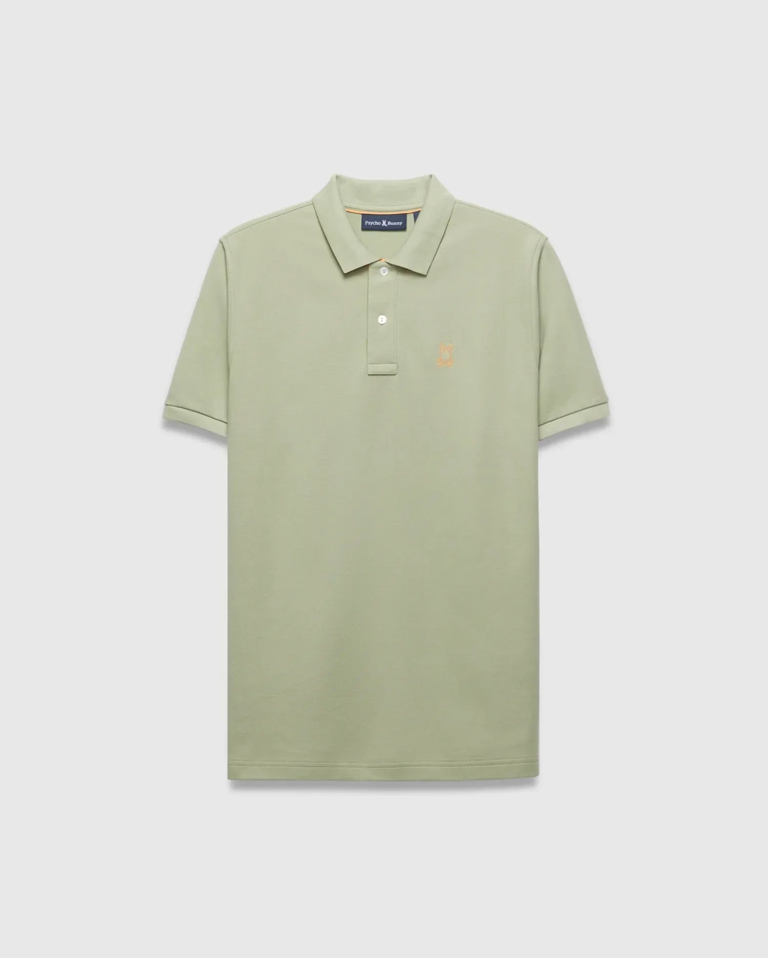 Mens Blythe Pique Polo in sage green, a classic fit polo with textured pique fabric, two-button placket, and a small embroidered orange Psycho Bunny skull logo on the left chest. (5)