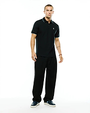 Men's Klaus Pique Polo, a classic fit black pique polo with light blue tipping on the collar and sleeve cuffs, featuring a small embroidered Psycho Bunny skull logo on the left chest. (4)