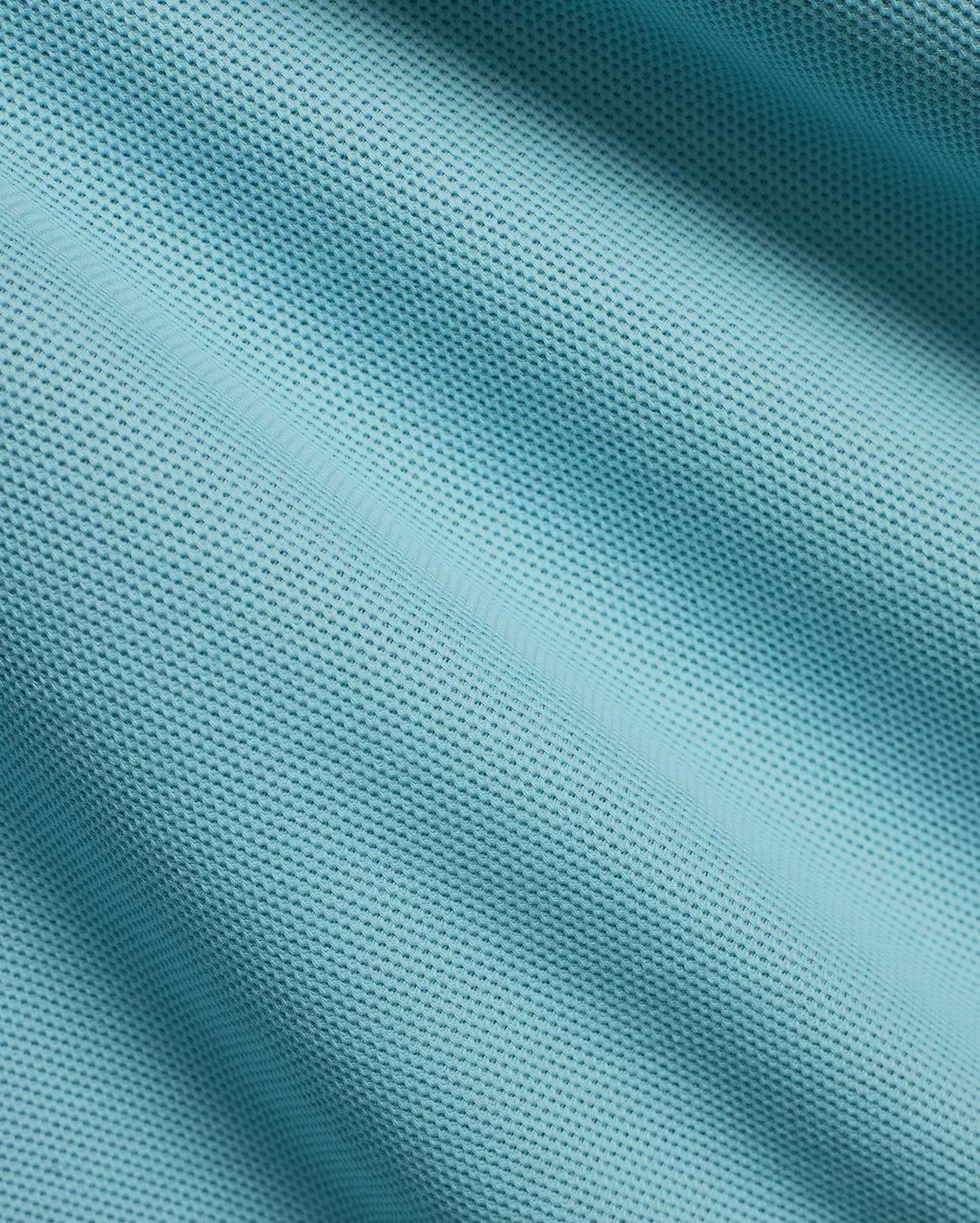 Men's Klaus Pique Polo in a serene aqua blue, highlighting the refined, breathable pique fabric texture with gentle folds and shadows, perfect for premium menswear. (6)