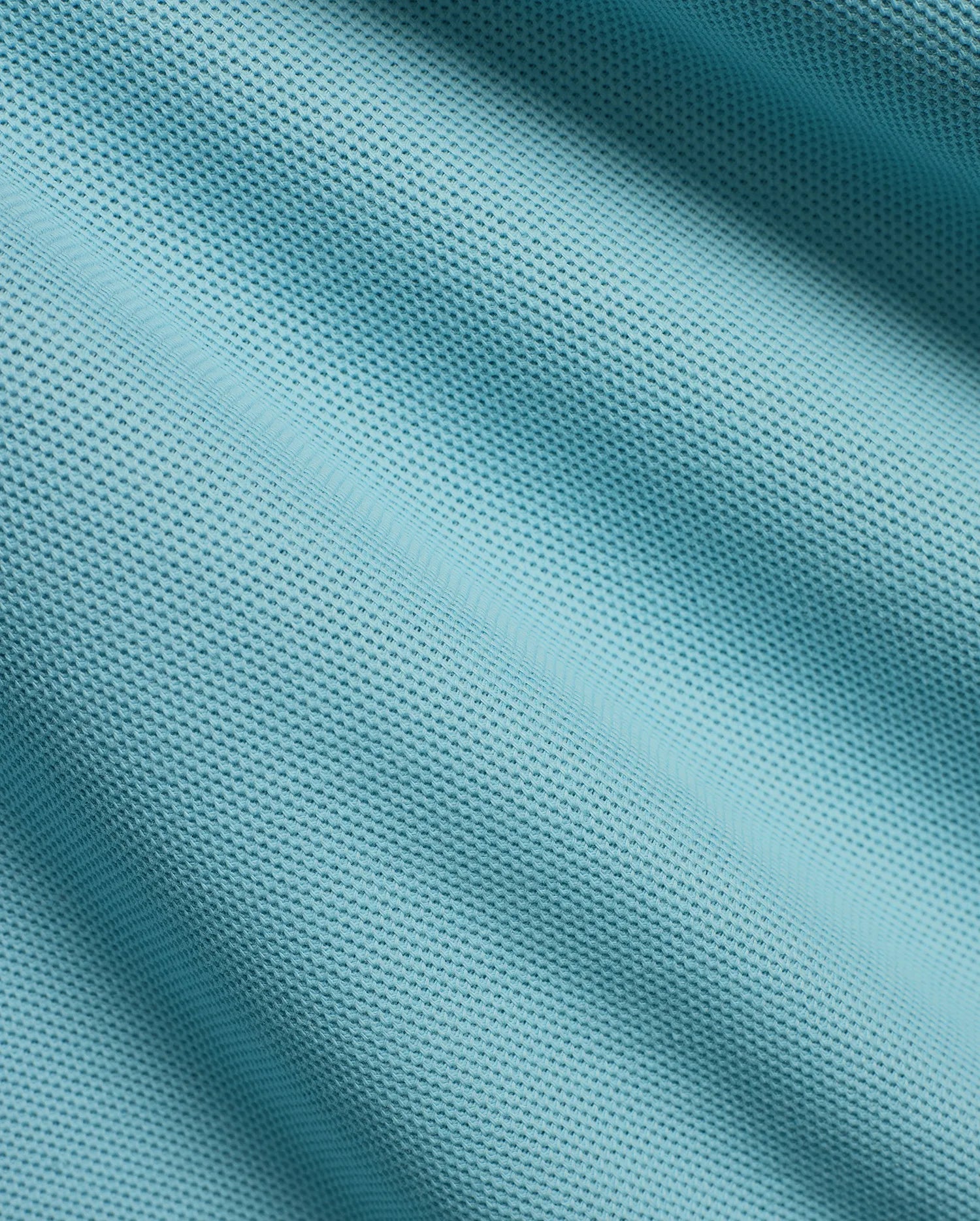 Men's Klaus Pique Polo in a serene aqua blue, highlighting the refined, breathable pique fabric texture with gentle folds and shadows, perfect for premium menswear. (6)