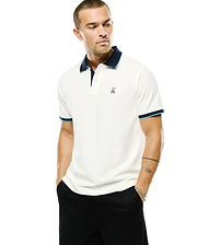 Men's Klaus Pique Polo in off-white, featuring a navy collar with light blue trim, matching striped sleeve cuffs, and a small embroidered Psycho Bunny skull logo on the left chest. (1)