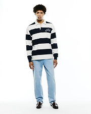 Mens Keven Ls Relaxed Fit Polo, a navy and white striped jersey knit with a white collar and an embroidered ATHL. DEPT Psycho Bunny EST. 2005 logo on the left chest.