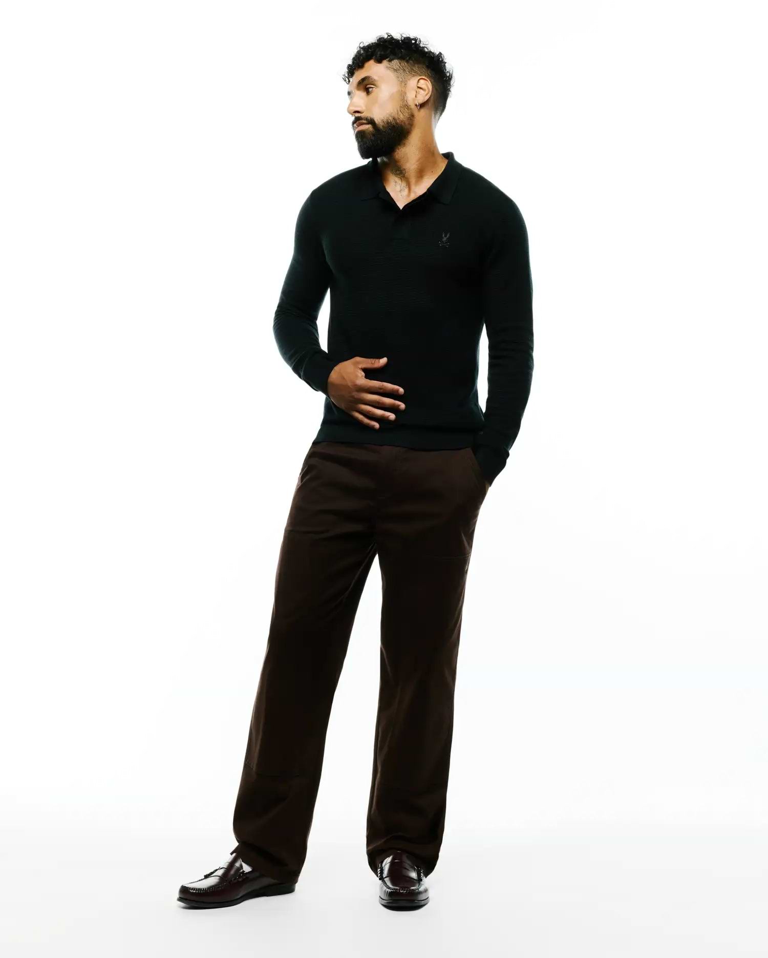 Deep green Mens Leroy Long Sleeve Knit Polo featuring a textured knit fabric, classic fit, and a small tonal embroidered Psycho Bunny skull logo on the left chest.