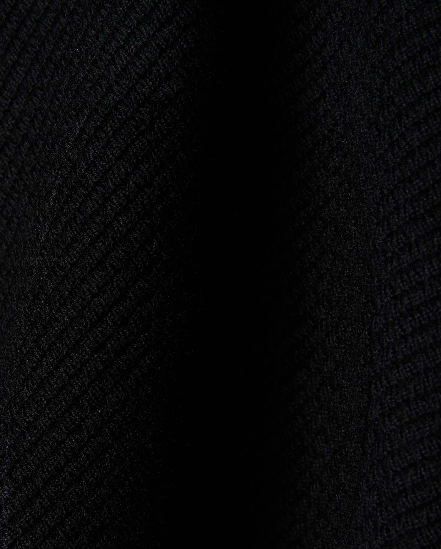 Black Mens Leroy Long Sleeve Knit Polo by Psycho Bunny, featuring a premium, subtly textured knit fabric with a refined, dense weave, perfect for sophisticated streetwear.