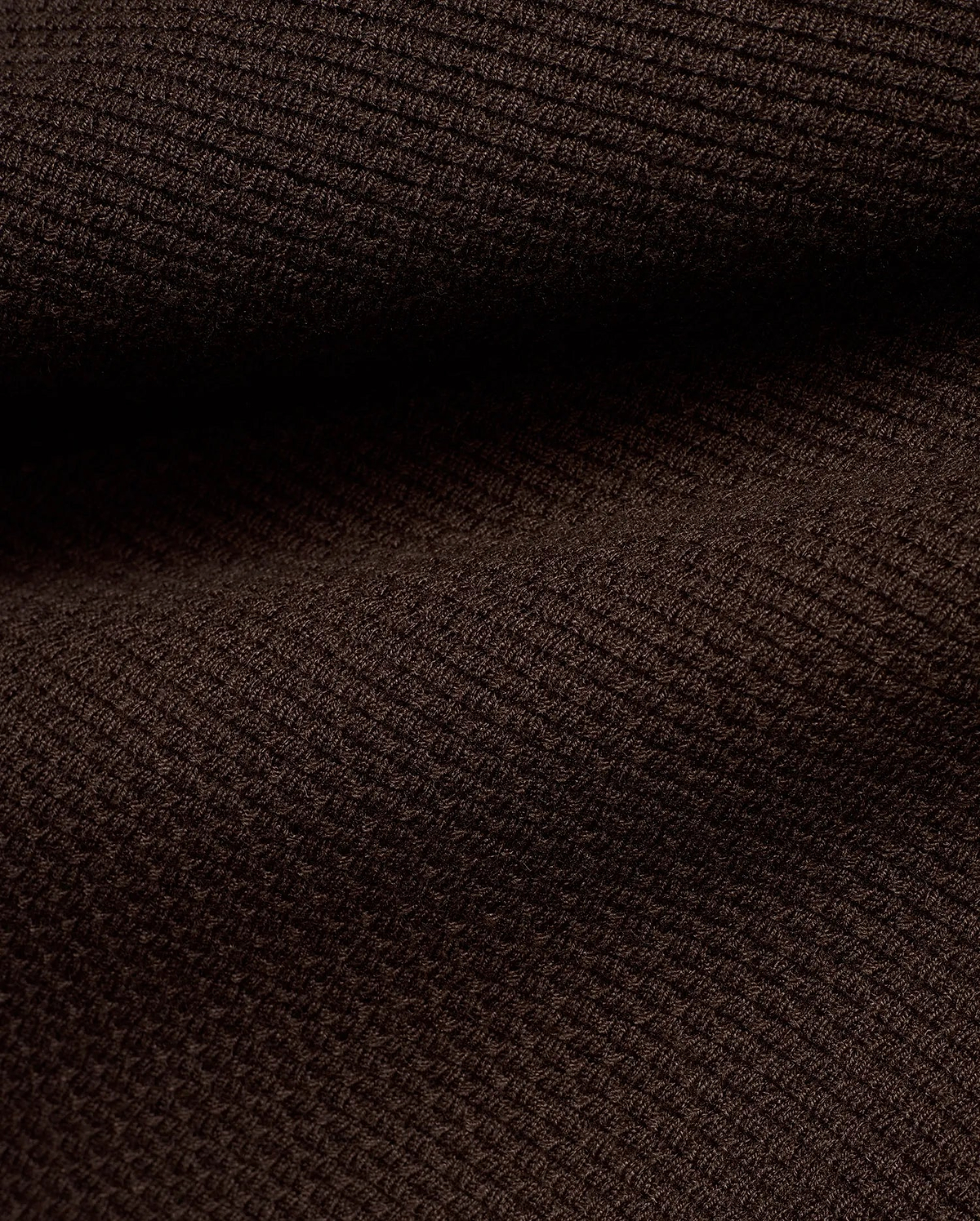Men's Leroy Longsleeve Knit Polo in rich dark brown, featuring a premium fine knit fabric with a subtle, refined diagonal ribbed texture, characteristic of Psycho Bunny's quality. (6)