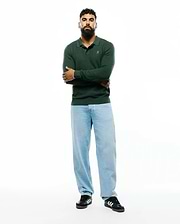 Mens Leroy Long Sleeve Knit Polo in deep forest green, featuring a classic fit, textured knit fabric, and a small white embroidered Psycho Bunny skull logo on the left chest.