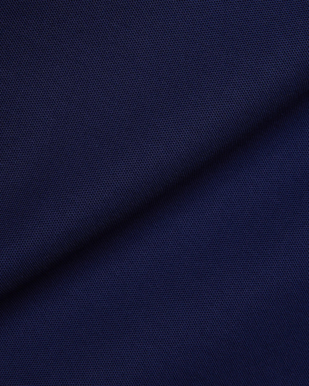 Mens Robin Pique Polo in a rich, deep navy blue, showcasing the classic textured pique fabric, a staple of Psycho Bunny's premium, refined streetwear collection.