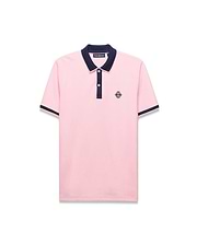 Mens Robin Pique Polo, light pink pique polo with navy ribbed collar, two-button placket, and sleeve cuffs. Features a small navy embroidered Psycho Bunny skull logo on the left chest. Classic fit.