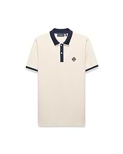Mens Robin Pique Polo, a classic fit cream pique polo with navy blue ribbed collar, two-button placket, cuffs, and an embroidered Psycho Bunny skull logo on the left chest.