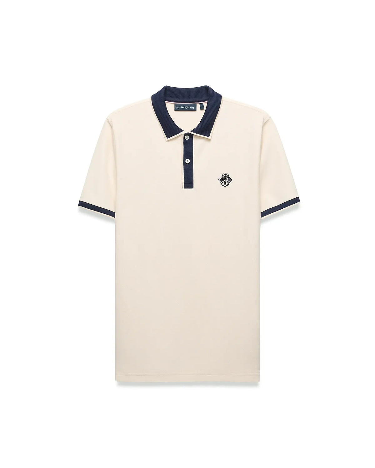 Mens Robin Pique Polo, a classic fit cream pique polo with navy blue ribbed collar, two-button placket, cuffs, and an embroidered Psycho Bunny skull logo on the left chest.