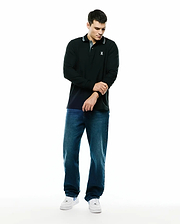 Men's Grover Pique Longsleeve Polo in black, featuring a classic fit, pique texture, grey collar with a white stripe, and a small white embroidered Psycho Bunny skull logo on the left chest. (4)