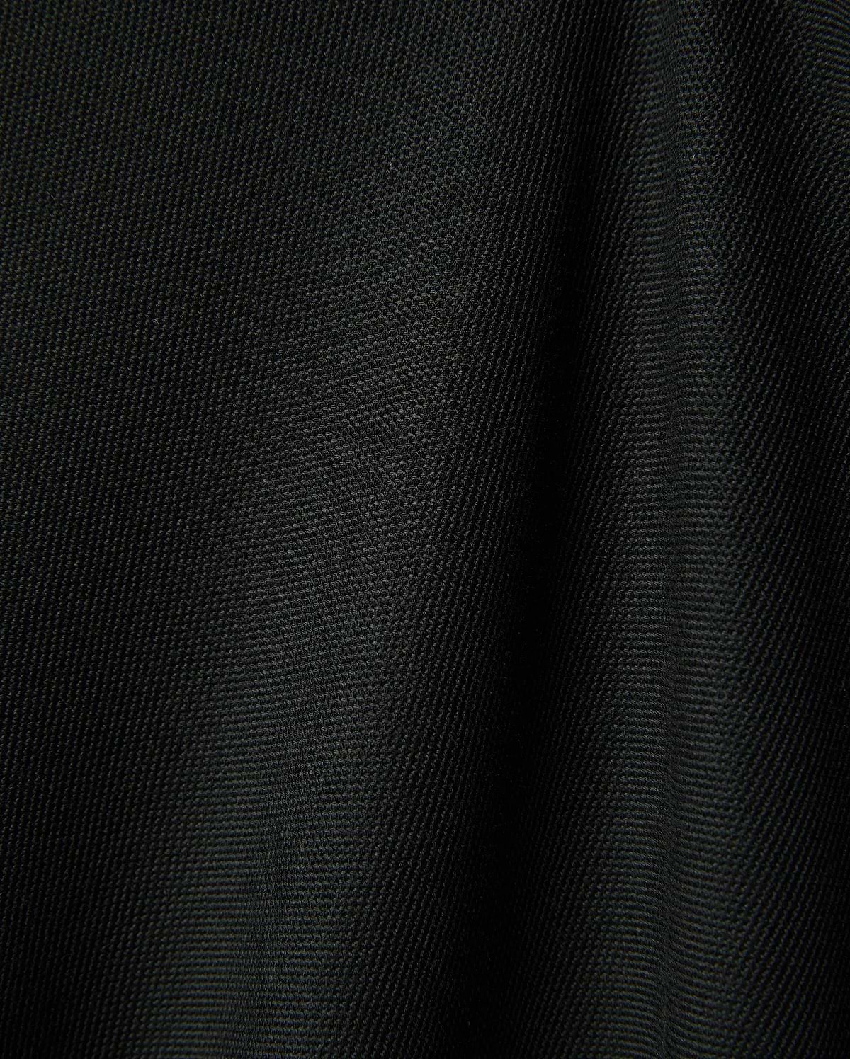Black Mens Ringston Pique Polo, showcasing its classic pique knit texture, featuring the iconic embroidered Psycho Bunny skull logo on the left chest.