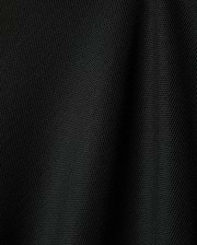 Black Mens Ringston Pique Polo, showcasing its classic pique knit texture, featuring the iconic embroidered Psycho Bunny skull logo on the left chest.