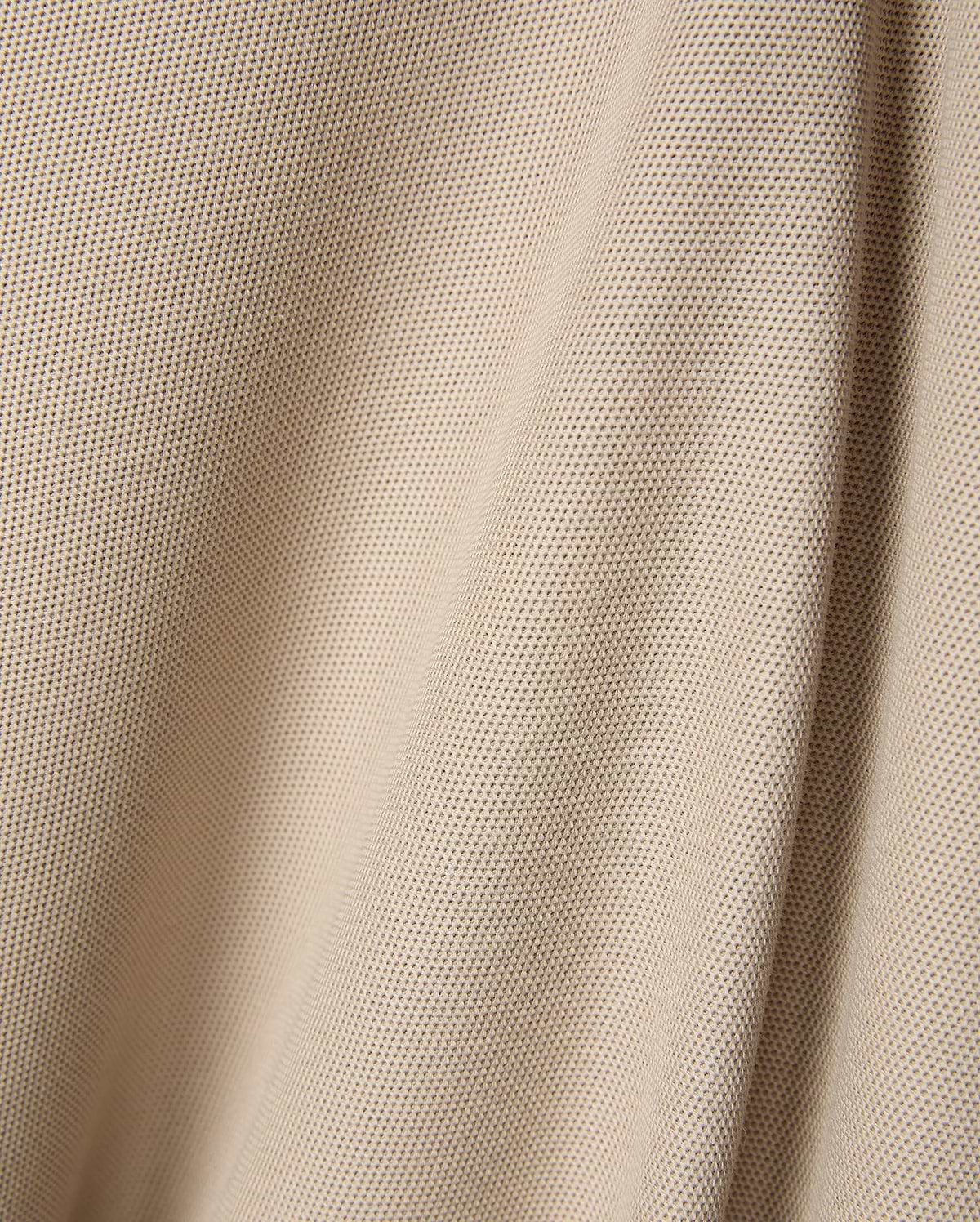 Premium beige Mens Ringston Pique Polo, showcasing a refined textured pique knit fabric, designed for a classic fit, with the iconic embroidered Psycho Bunny skull logo on the chest.