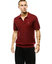 Men's Devon Braided Knit Polo in rich burgundy, featuring a textured braided knit, open V-neck collar, ribbed hem, and small embroidered red Psycho Bunny skull logo on the left chest for a classic fit. (3)
