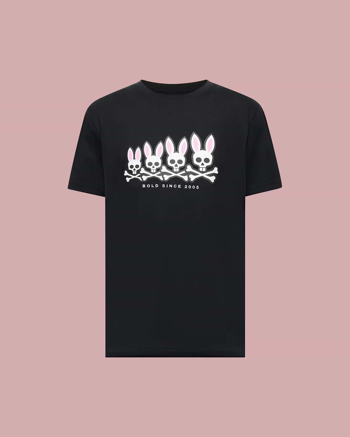 The Psycho Bunny MENS ARCHIVE GRADIANT BUNNY GRAPHIC TEE (MT0200029) showcases four iconic white and pink Bunny skull and crossbones with "BOLD SINCE 2005" text, set against a plain light pink background. (1)